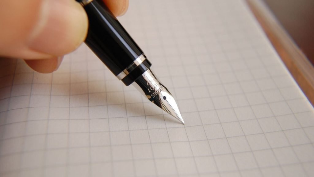 Luxury metal pen and tracing paper
