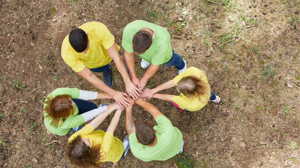 people stacking hands