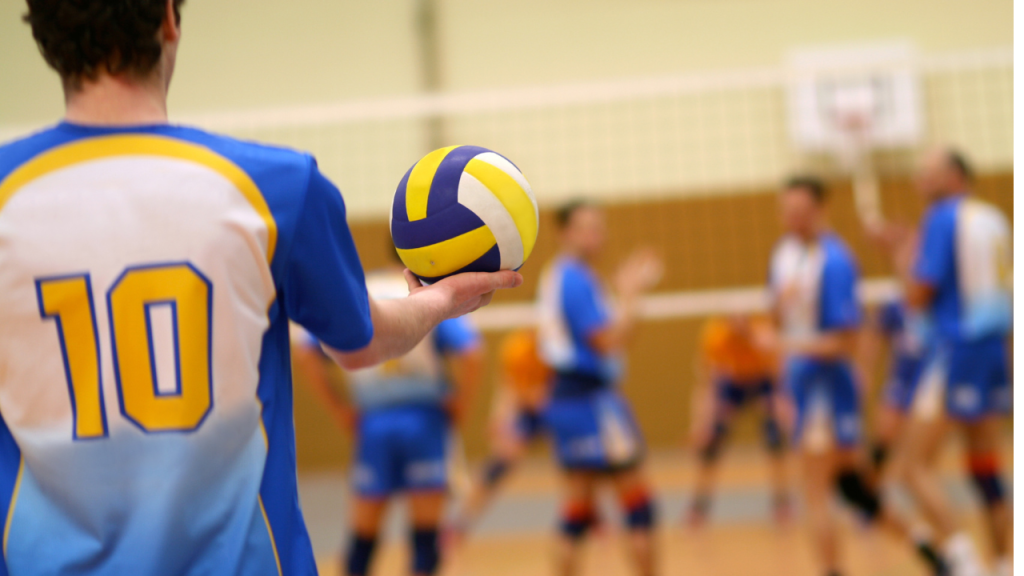 volleyball player getting ready to serve